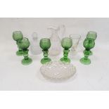 Set of six green tinted continental engraved wine glasses in the Dutch-style with knopped baluster