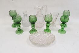 Set of six green tinted continental engraved wine glasses in the Dutch-style with knopped baluster