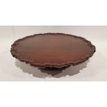 Victorian mahogany lazy susan with piecrust top, on turned base