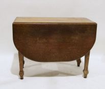 Early 20th century oak drop-leaf table on square section supports