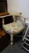 Cream painted corner elbow chair with floral fabric stuffover seat, a Victorian mahogany single