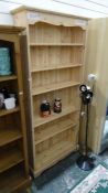 20th century lime washed pine open bookcase, on bracket feet, 90cm x 199cm