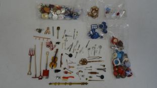 Quantity of dolls house accessories to include decorative china and glass jugs and vases, Willow