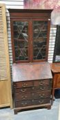 20th century George III-style bureau bookcase, the moulded cornice with Greek key decoration and