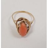 14K gold and coral ring set torpedo-pattern coral, on open wirework surround