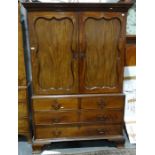 George III-style mahogany wardrobe, the moulded cornice with Green key applied moulding, above two