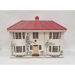 Vintage doll's house with sliding painted metal frontage, modern furniture to interior