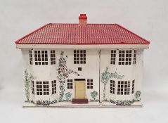 Vintage doll's house with sliding painted metal frontage, modern furniture to interior