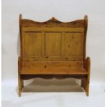 20th century pine settle with shaped top rail, panelled back, shaped sides, 128.5cm wide