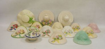 Large collection of Soho Pottery Solian Ware hat wall pockets, circa 1930 and later, printed