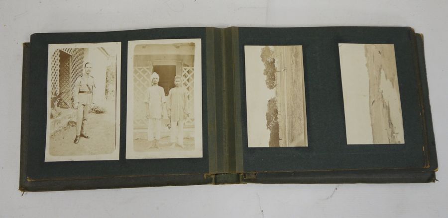 Photograph album and contents of black and white vintage photographs to include figures on