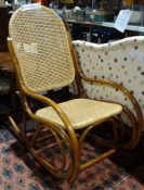 20th century bentwood rocking chair in the manner of Thonet, with cane seat and back