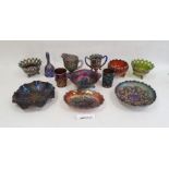 Large collection of carnival glass, early 20th century, in amethyst blue, green and marigold