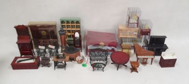 Assorted dolls house furniture and accessories to include rugs, dolls, miniature dolls house dolls