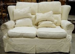 Marks & Spencers two-seat sofa and two single armchairs in pale cream coloured foliate pattern