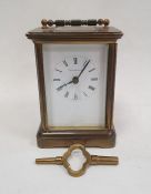 20th century brass carriage clock, the dial marked 'Tiffany & Co', the movement by Matthew Norman,