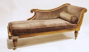 Victorian chaise longue on turned and carved supports to brass caps and castors, upholstered in pale