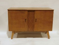 Mid-century modern Meredew oak sideboard with two cupboard doors, central panel with diamond