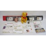Collection of first day covers, a Winnie the Pooh soft toy, a Johnnie Walker jug and a Japanese-