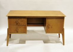 Mid-century modern Meredew oak dressing table / desk with drawers and cupboard door, on tapering