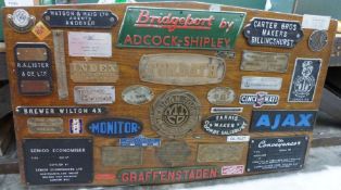 Mounted metal signs, including Bridgeport, Michigan Tool Co, and Ajax etc