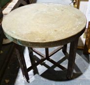 Eastern style table with embossed copper top on foldable X-frame base