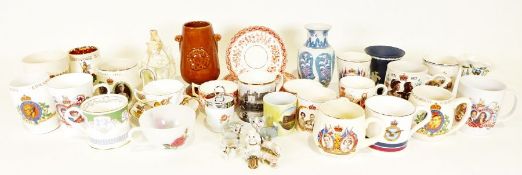 Assorted ceramics to include Wade animals, a dark blue Wedgwood vase, ornaments, mugs, Seriesware