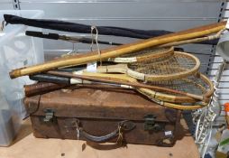 Various vintage tennis rackets by Dunlop, Courtcraft, etc, a leather suitcase, a fishing rod and a