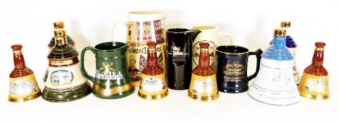 Quantity of Bells Scotch whiskey souvenir bottles, shaped as bells in various sizes, advertising
