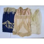 Various vintage lingerie to include a dark blue satin petticoat trimmed with undyed lace, a cream