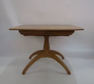 Ercol light elm extending table 104cm long x 90cm wide x 73cm high (extended 148cm long) and four