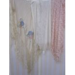 Two vintage cobweb shawls, one cream, one pink and a Chinese-style silk embroidered shawl with a