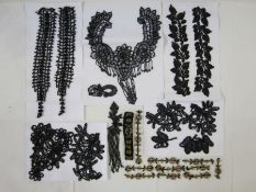 Victorian jet bead dress and costume accessories, epaulettes, decorations  etc, pinned on card,
