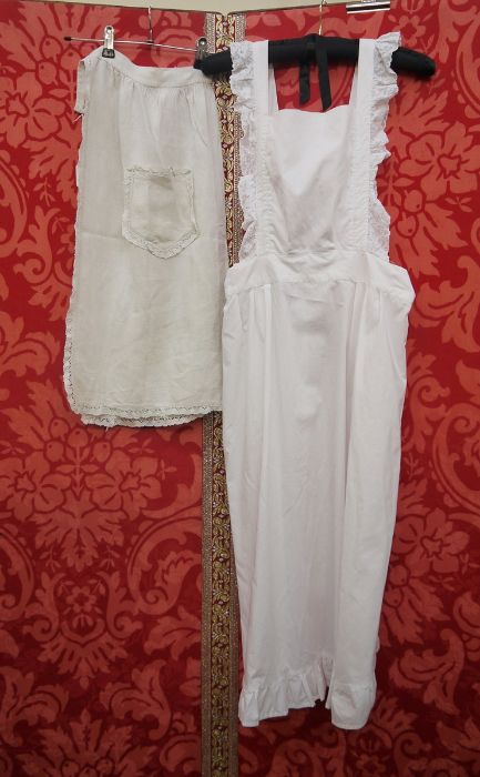 Early 20th century pinafore with lace detail and tie-back, frilled edges, a vintage apron, a