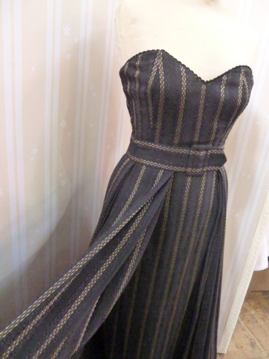 Chris Clyne Collection Black silk strapless fitted evening gown, with belted overskirt , boned - Image 3 of 3