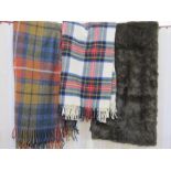 Modern faux-fur bedspread throw, a lambswool tartan travel rug and another (3)