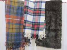 Modern faux-fur bedspread throw, a lambswool tartan travel rug and another (3)