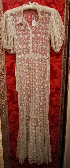 1930's lace full-length dress with short puff sleeves, popper side fastening and front fastening