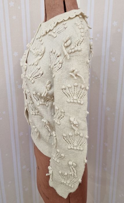 Oriental style embroidered jacket with a cream knitted jumper with applique design and pearl buttons - Image 5 of 5