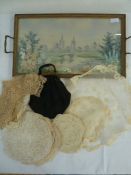 Lace doilies, collars, table mats and food covers, a black fabric evening bag with fixed frame and