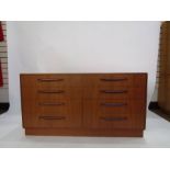 G-Plan teak chest of eight drawers in two rows on plinth base and scroll handles  (140cm wide x 73cm