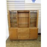 Ercol dresser with glazed doors flanking central glass shelves, base of two cupboard doors and 3