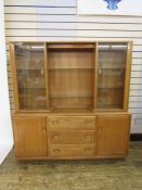 Ercol dresser with glazed doors flanking central glass shelves, base of two cupboard doors and 3