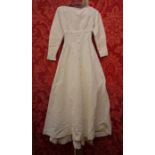 Grosgrain wedding dress in cream, 1960's, full skirt, fitted bodice, empire line, buttons down the