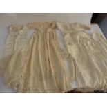 A vintage silk/bib front shirt,a lace fichu , lace and silk christening gown with petticoats,