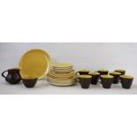 Set of Poole Pottery twintone brown and yellow range tableware including amount of 8 cups, 7