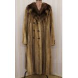 Vintage mink coat with deep shawl collar, button detail to the bell sleeves, double-breasted