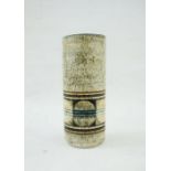A Troika Pottery cylindrical vase, decorated with a band of circles, signed Troika Cornwall CH