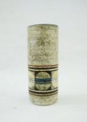 A Troika Pottery cylindrical vase, decorated with a band of circles, signed Troika Cornwall CH