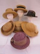 Assorted hats to include black feather hat, woven hats, tartan fabric hat, etc and two retro hat